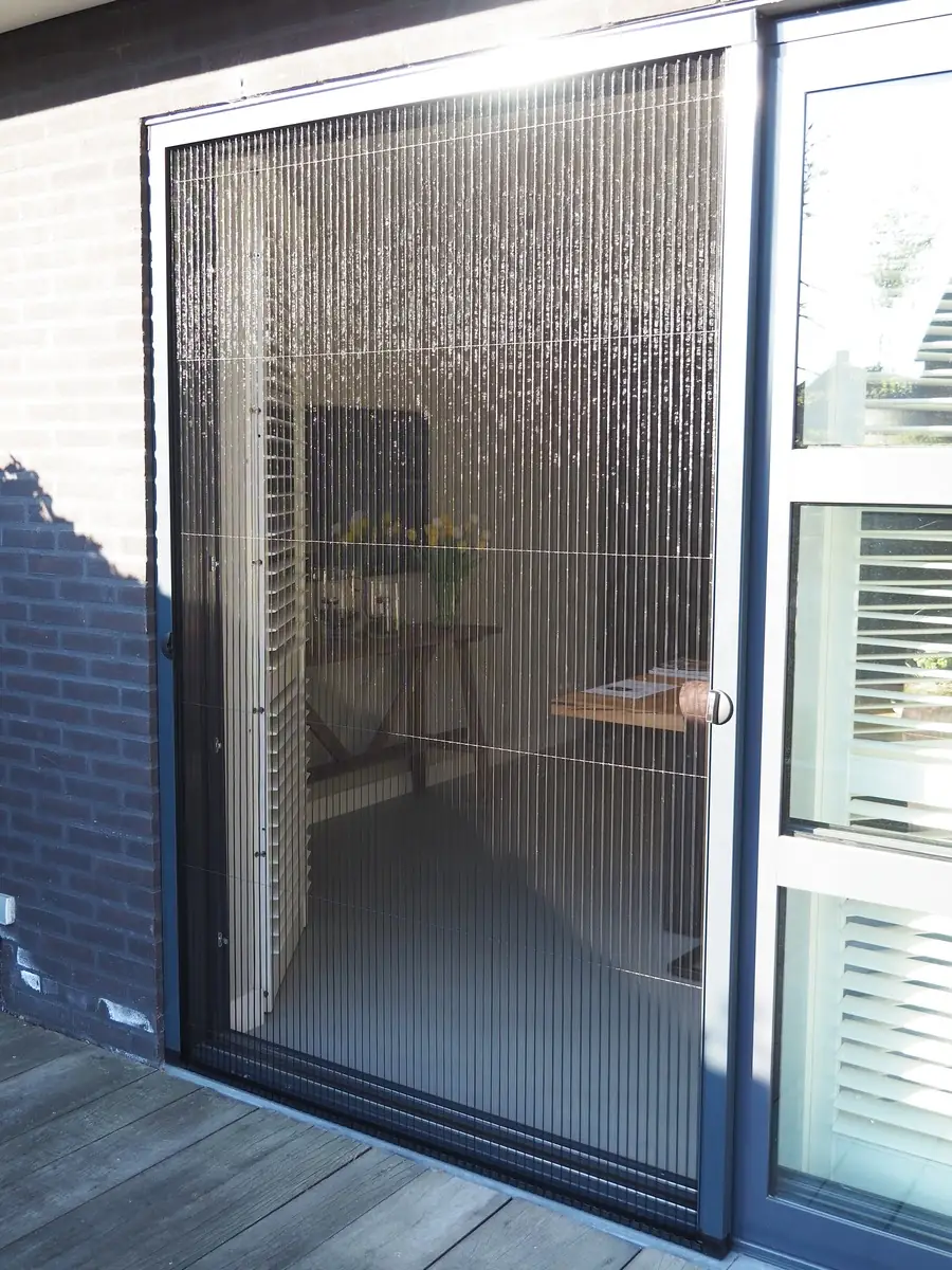 Plissé hordeur voor een schuifpui naar het terras